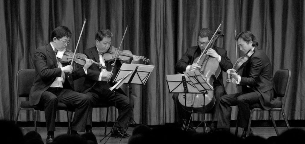 Shanghai Quartet playing black and white